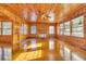 Living room with wood paneled walls and hardwood floors at 5515 Porcher Dr., Myrtle Beach, SC 29577