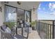 Inviting balcony with seating, plants, and a partial view of the interior living space at 5523 N Ocean Blvd. # 1601, Myrtle Beach, SC 29577