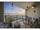 Charming balcony with outdoor seating, plants, and stunning ocean views at sunset at 5523 N Ocean Blvd. # 1601, Myrtle Beach, SC 29577