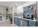 Modern kitchen boasts stainless appliances, designer backsplash, and sleek countertops at 5523 N Ocean Blvd. # 1601, Myrtle Beach, SC 29577