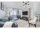 Cozy living room with a sofa, fireplace, and balcony providing an inviting space to relax at 5523 N Ocean Blvd. # 1601, Myrtle Beach, SC 29577