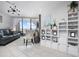 Bright living room featuring stylish decor, modern lighting, and sliding glass doors to a balcony at 5523 N Ocean Blvd. # 1601, Myrtle Beach, SC 29577