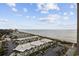 High-angle view of the ocean and condo complex, showcasing its beachfront location at 5523 N Ocean Blvd. # 1601, Myrtle Beach, SC 29577