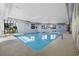 Indoor pool area with natural lighting and architectural accents; depth markings shown at 5523 N Ocean Blvd. # 1601, Myrtle Beach, SC 29577