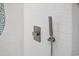 Close up of tiled shower with mounted shower head at 5523 N Ocean Blvd. # 1601, Myrtle Beach, SC 29577
