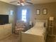 Small bedroom with twin bed and recliner at 557 White River Dr. # 12A, Myrtle Beach, SC 29579