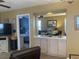 View of bedroom from living room with mirror at 557 White River Dr. # 12A, Myrtle Beach, SC 29579