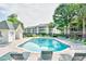 Community pool with plenty of lounge chairs at 557 White River Dr. # 12A, Myrtle Beach, SC 29579