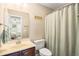 Clean bathroom with shower/tub combo, vanity, and linen closet at 569 Miromar Way, Myrtle Beach, SC 29588