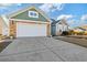 Two-car garage with stone and siding exterior at 569 Miromar Way, Myrtle Beach, SC 29588