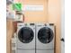 Laundry room with LG washer and dryer and shelving at 569 Miromar Way, Myrtle Beach, SC 29588