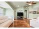 Relaxing living room with hardwood floors and large screen TV at 569 Miromar Way, Myrtle Beach, SC 29588