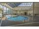 Indoor heated pool with skylights and seating at 5905 South Kings Hwy. # 4205, Myrtle Beach, SC 29575