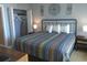 Main bedroom with king-size bed and closet at 601 Retreat Beach Circle # 128, Pawleys Island, SC 29585