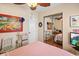 Spacious bedroom with a double bed, mirrored closet, and beach-themed art at 703 3Rd Ave. S, North Myrtle Beach, SC 29582