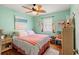 Bedroom with a charming coastal vibe and a queen bed at 703 3Rd Ave. S, North Myrtle Beach, SC 29582