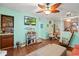 Bright living room features hardwood floors, decorative accents, and a ceiling fan at 703 3Rd Ave. S, North Myrtle Beach, SC 29582