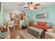 Open living room with coastal decor and view of dining area at 703 3Rd Ave. S, North Myrtle Beach, SC 29582