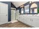 Elegant bathroom with double sinks, a large shower, and stylish navy accents at 771 Flowering Branch Ave., Little River, SC 29566