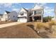 Two-story home with stone accents and a 2-car garage at 771 Flowering Branch Ave., Little River, SC 29566