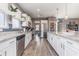 Spacious kitchen featuring granite countertops and white cabinets at 771 Flowering Branch Ave., Little River, SC 29566