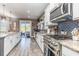 Modern kitchen with stainless steel appliances and an island at 771 Flowering Branch Ave., Little River, SC 29566