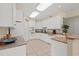 Galley kitchen with white cabinets and granite counters at 8223 Forest Lake Dr., Conway, SC 29526