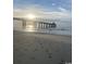 Scenic view of the beach and pier at sunrise at 8650 Southbridge Dr. # A, Surfside Beach, SC 29575