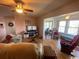 Spacious living room with sunroom and hardwood floors at 8650 Southbridge Dr. # A, Surfside Beach, SC 29575