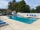 Community pool with plenty of lounge chairs at 8650 Southbridge Dr. # A, Surfside Beach, SC 29575