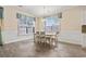 Light and bright dining area with tile floors and window seating at 912 Lorenzo Dr., North Myrtle Beach, SC 29582