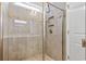 Walk-in shower with tiled walls and built-in shelf at 912 Lorenzo Dr., North Myrtle Beach, SC 29582