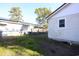 Small backyard with chain link fence and patchy grass at 916 Maple St., Mullins, SC 29574