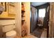 Simple bathroom with shower and built-in shelving at 916 Maple St., Mullins, SC 29574