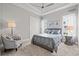 Secondary bedroom with neutral decor and natural light at 9387 Venezia Circle, Myrtle Beach, SC 29579