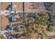 Aerial view of a neighborhood with several houses and empty lots at 9815 W Highway 19, Loris, SC 29569