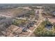 Wide aerial view of a large neighborhood with many houses at 9815 W Highway 19, Loris, SC 29569