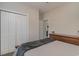 Bedroom with a wooden dresser and double door closet at 9815 W Highway 19, Loris, SC 29569