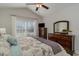 Main bedroom with a king-size bed and plenty of natural light at 9815 W Highway 19, Loris, SC 29569