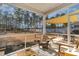 Screened porch with a view of the backyard and shade sail at 9815 W Highway 19, Loris, SC 29569