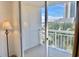 Balcony with partial ocean view and palm trees at 9820 Queensway Blvd. # 206, Myrtle Beach, SC 29572