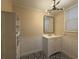 Clean bathroom with white vanity, patterned floor and a large mirror at 10 Buckthorn St., Andrews, SC 29510