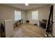 Roomy bedroom with hardwood floors and ample natural light at 10 Buckthorn St., Andrews, SC 29510