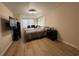 Bright bedroom with wood-look flooring and plenty of space for furniture at 10 Buckthorn St., Andrews, SC 29510