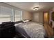 Bedroom featuring natural light, neutral tones and a plush comforter on the bed at 10 Buckthorn St., Andrews, SC 29510