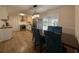 Dining area with a view of the backyard and kitchen at 10 Buckthorn St., Andrews, SC 29510