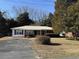 Ranch style home with a brick facade and a well-maintained lawn at 10 Buckthorn St., Andrews, SC 29510