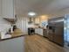 Open concept kitchen with butcher block counters, stainless steel appliances and lots of cabinet space at 10 Buckthorn St., Andrews, SC 29510