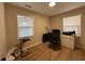 This office features natural light and neutral walls and wood-look floors at 10 Buckthorn St., Andrews, SC 29510