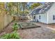 Landscaped backyard with raised garden beds at 101 Bent Tree Ln., Pawleys Island, SC 29585